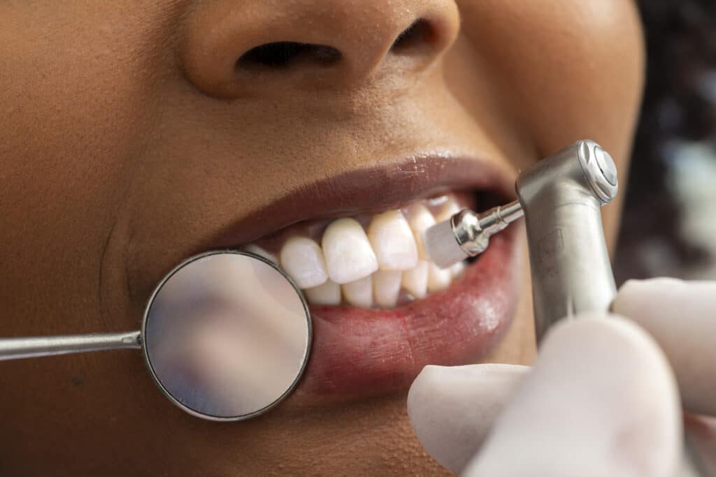 Patient receiving a teeth cleaning