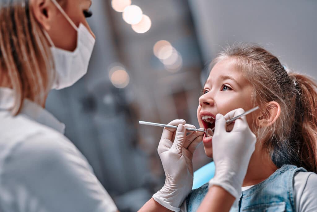 patient receiving a dental cleaning
