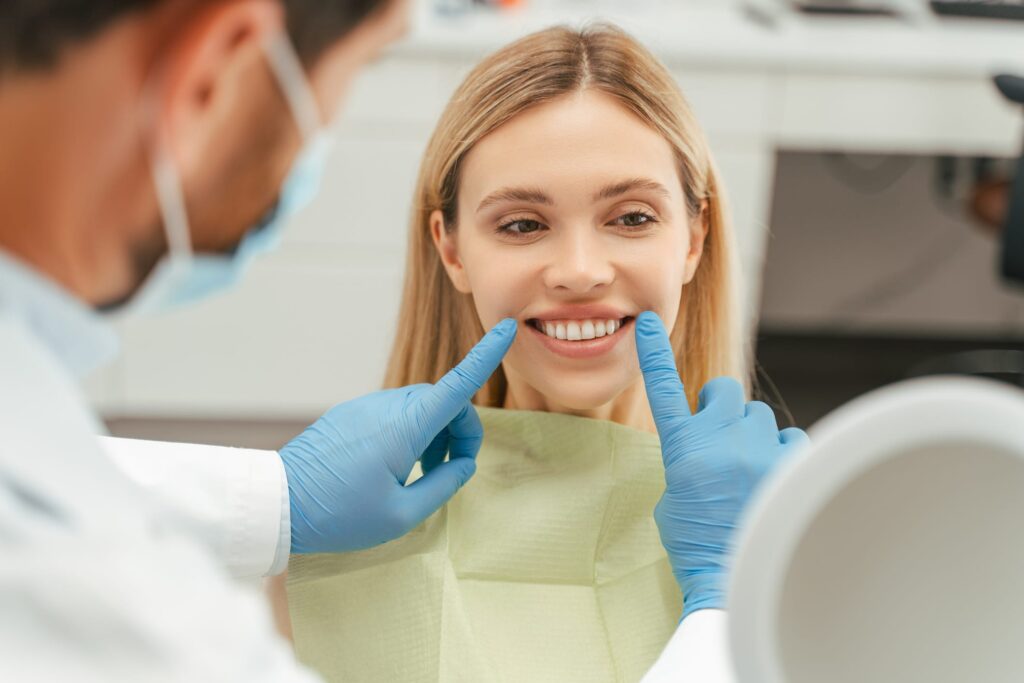 Dentist removing coffee stains